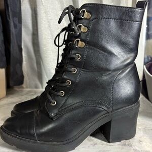 Woman’s black heeled boots size 10